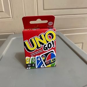 Brand New Mini Uno Go pocket Sized Cards.